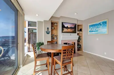 a dining room with a table and chairs at OCEAN FRONT - STUNNING VIEWS- VACATION PARADISE!! in Dana Point