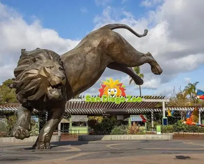 a statue of a lion in front of a store at Ocean View From Private Patio, Across Street From Beach in Carlsbad