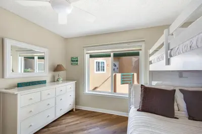 a bedroom with a bunk bed and a window at San Miguel #8 in Oceanside
