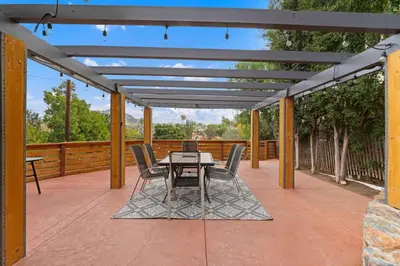a patio with a table and chairs on it at Designer 4 BR La Mesa Home w/ Yard and BBQ in La Mesa