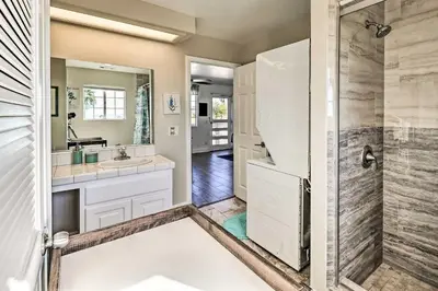 a bathroom with a sink and a shower at Garden, Gazebo and Fire Pit Fallbrook Home! in Fallbrook
