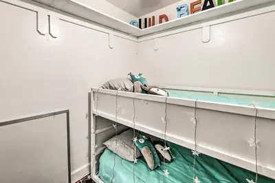 a room with a bunk bed with pillows at Garden, Gazebo and Fire Pit Fallbrook Home! in Fallbrook