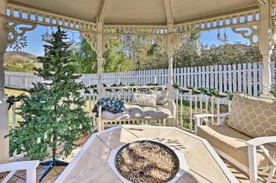 a gazebo with a christmas tree on a porch at Garden, Gazebo and Fire Pit Fallbrook Home! in Fallbrook