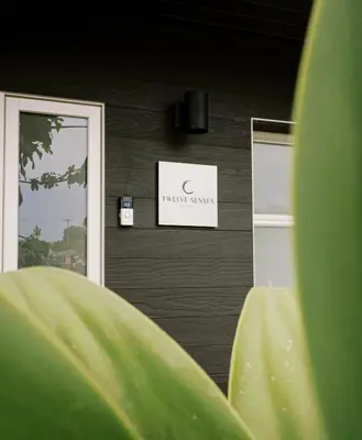 a store with a sign on the wall at Twelve Senses Retreat in Encinitas