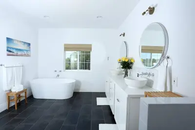 a white bathroom with two sinks and a tub and mirror at Ask about the 100 Dollar Taco Caterer for 10 and Free Wine Tickets in Temecula