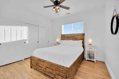 a bedroom with a large bed and a ceiling fan at Ask about the 100 Dollar Taco Caterer for 10 and Free Wine Tickets in Temecula