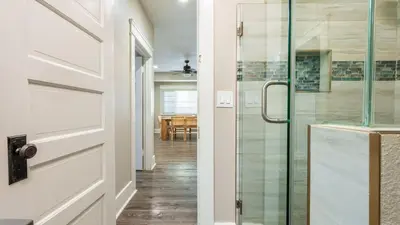 a glass door in a kitchen with a dining room at Sea Sight by AvantStay Walk to Newport Beach in Newport Beach