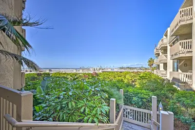 a view of the beach from the balcony of a condo at Deja Blue Oceanside Condo on Beach with Pools! in Oceanside