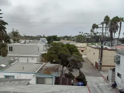 an aerial view of a city with houses and trees at Master SUITE STEPS TO BAY & BEACH in San Diego