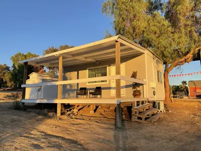 a house that is sitting on a tree at Rejuvenation Cottage - Wine Country Tranquility in Temecula