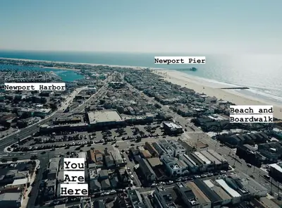 an aerial view of a city and the beach at Beach house in the heart of balboa peninsula in Newport Beach