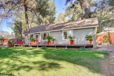 a house with a porch with potted plants on it at Fallbrook Vacation Rental 3 Mi to Wineries! in Fallbrook
