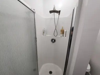 a bathroom with a shower and a toilet at Private Room1 Own Bath Own Entry Shared Kitchen Walk to UCSD in San Diego