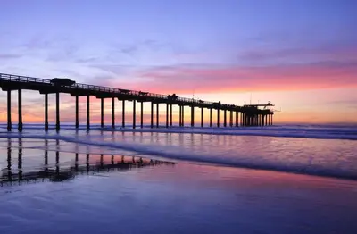 a pier on the beach with the ocean at Private Room3 Own Entry Shared Bath One Guest Walk to UCSD in San Diego