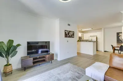 a living room with a television and a couch at Modern Pet-Friendly San Diego Vacation Rental in San Diego