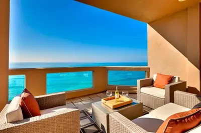 a living room with a view of the ocean at Celebrity Oceanfront Estate in San Diego