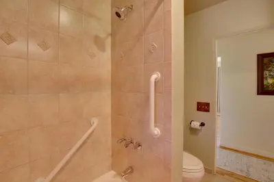 a bathroom with a shower and a toilet at Charming Spring Valley Retreat with Private Pool! in Spring Valley