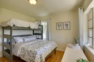 a bedroom with a bunk bed and a window at Charming Spring Valley Retreat with Private Pool! in Spring Valley