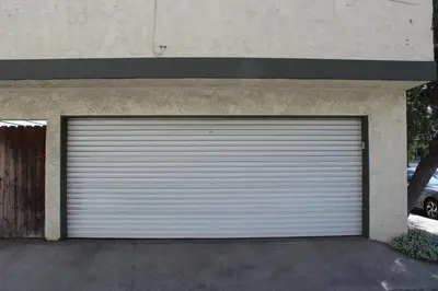 a white garage door on the side of a building at 201 Ruby in Newport Beach