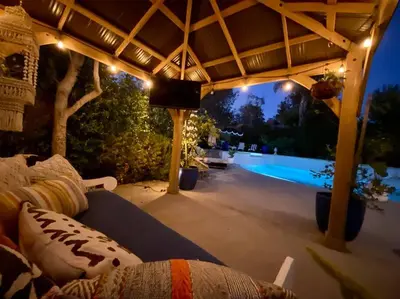 a patio with a pergola and a swimming pool at Your Private Resort near Coast in Oceanside