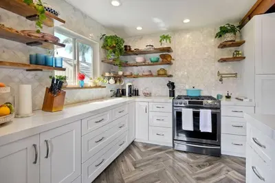 a kitchen with white cabinets and a stove at Your Private Resort near Coast in Oceanside
