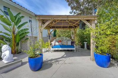 a gazebo with a blue couch under it at Your Private Resort near Coast in Oceanside