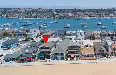 an aerial view of a harbor with houses and boats at 1005 E Balboa 2 in Newport Beach