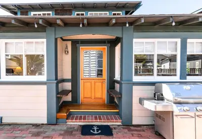 a house with a front door and a grill at 318 Lindo Ave in Newport Beach