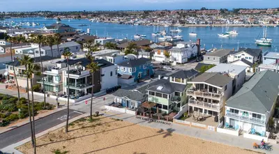 an aerial view of a city with houses and a harbor at 1002 E Oceanfront in Newport Beach