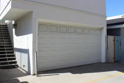 a white garage door on a white building at 114 Forty Second Street B in Newport Beach