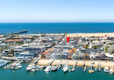 an aerial view of a marina with boats in the water at Pier to Pier in Newport Beach