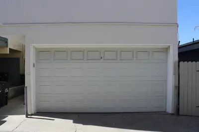 a garage with a white garage door at 114 Forty Second Street A and B in Newport Beach