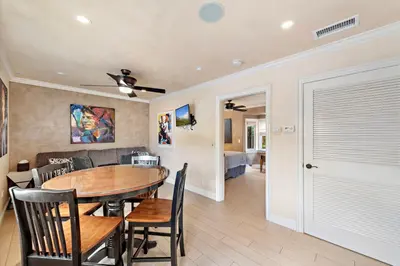 a kitchen and dining room with a table and chairs at Villa Rustico at the Retreat in Laguna Beach in Laguna Beach