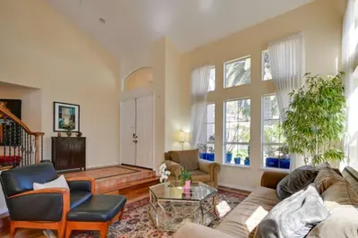 a living room with a couch and a table at 1 Mi to the Beach! Ocean-View Encinitas Home in Encinitas