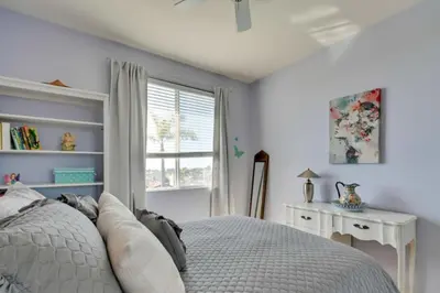 a bedroom with a bed and a window at 1 Mi to the Beach! Ocean-View Encinitas Home in Encinitas