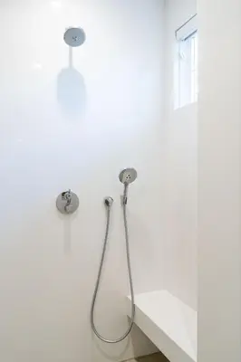 a shower in a bathroom with white walls at Escape to Luxury Newport Coast Pelican Gated Home in Newport Beach