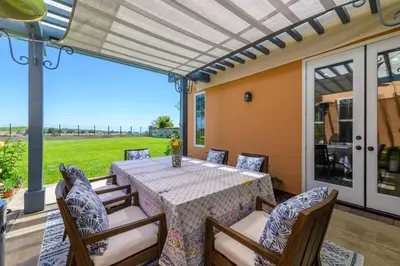 a dining room with a table and chairs at Escape to Luxury Newport Coast Pelican Gated Home in Newport Beach