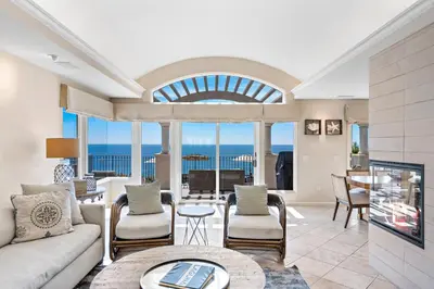 a living room with a couch and chairs at Laguna Villa in Laguna Beach