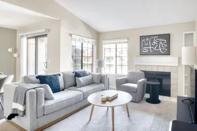 a living room with a couch and a fireplace at La Jolla 1br w gym wd pool nr bars shops SAN-7 in San Diego