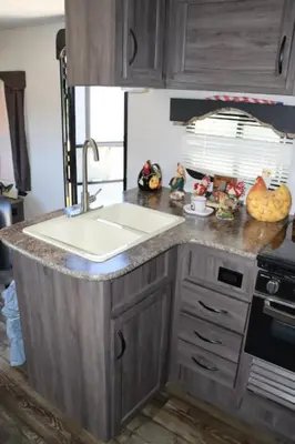 a kitchen with a sink and a counter top at RV quiet place in the mountain in Hemet