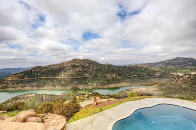 an aerial view of a lake and mountains at Mountaintop Ramona Home Private Pool, Near Lake! in Ramona