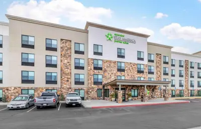 a rendering of a hotel with cars parked in a parking lot at Extended Stay America Premier Suites - San Diego - San Marcos in San Marcos